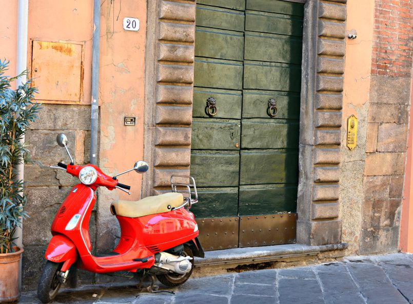 red vespa in lucca