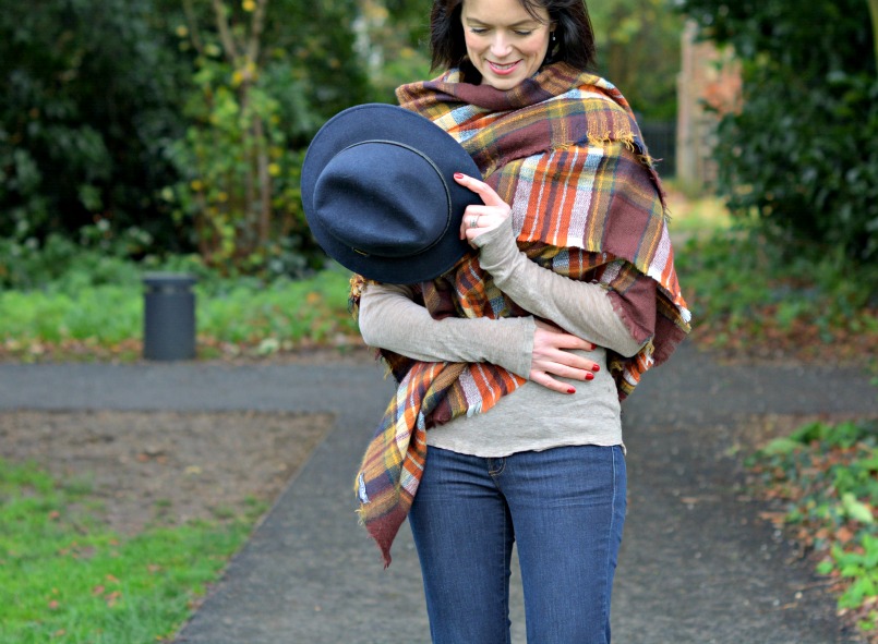 Laura Ashley reds and browns check wrap | J Brand jeans flares | Laura Ashley navy blue fedora hat | Marc by Marc Jacobs tan wedge heel 70s shoes