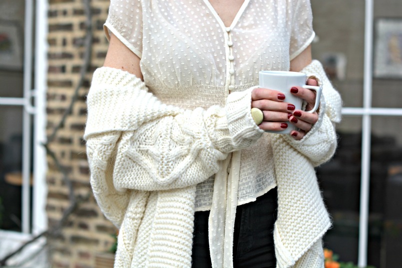 Gharani Strok cream cable knit belted cardigan | J Brand black ripped jeans | Prada tortoiseshell sunglasses | Coast cream chiffon button through top