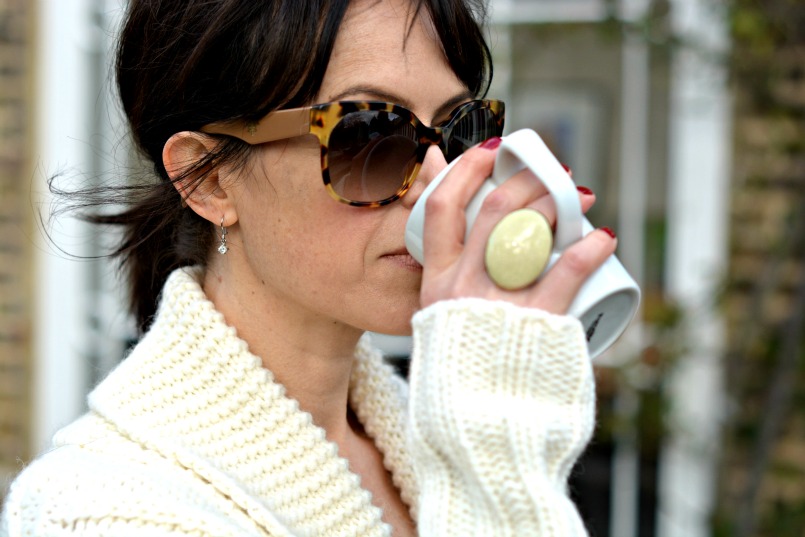 Gharani Strok cream cable knit belted cardigan | Prada tortoiseshell sunglasses | Coast cream chiffon top | Isabel Marant cream cocktail ring