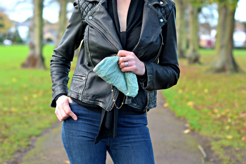 Allsaints Cargo leather biker jacket | J Brand cut off Bardot jeans | Zara tie neck black knit top | Vintage accessorize blue small silk purse bag