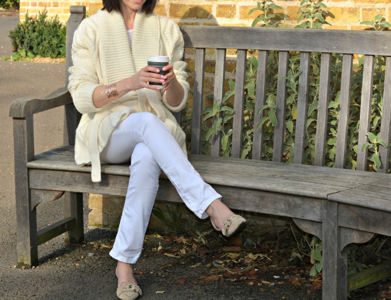 Eternal Collection Vogue Rose gold tone bangle | White Company London white skinny jeans | Prada beige pointed toe kitten heel shoes | 3.1 Phillip Lim handmade sunglasses | Gharani Strok cream cable knit belted cardigan