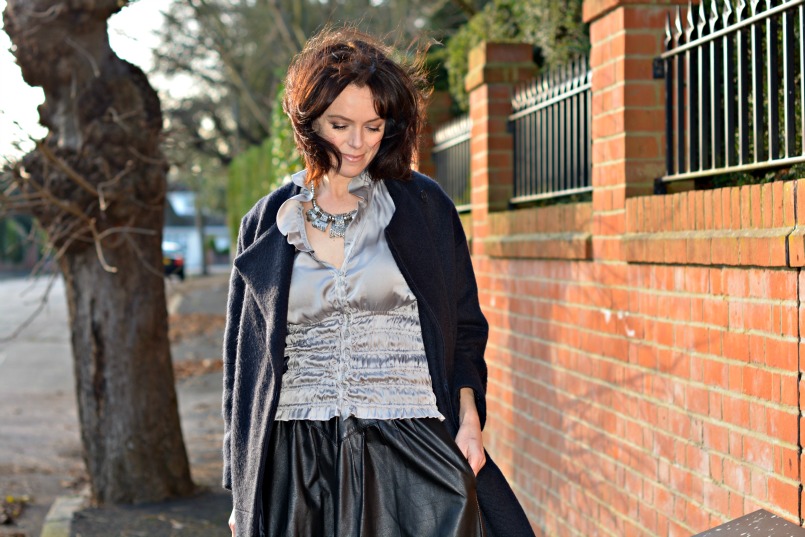 Zara silver ruched sleeveles top | Vintage full black leather midi skirt | Retro silver statement necklace | Maje midnight blue wool coat | 1930s Vintage beaded velvet bag