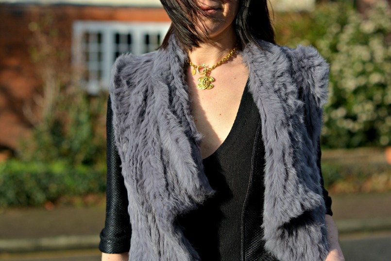 Chanel CC vintage choker | Burberry peplum top | fur gilet