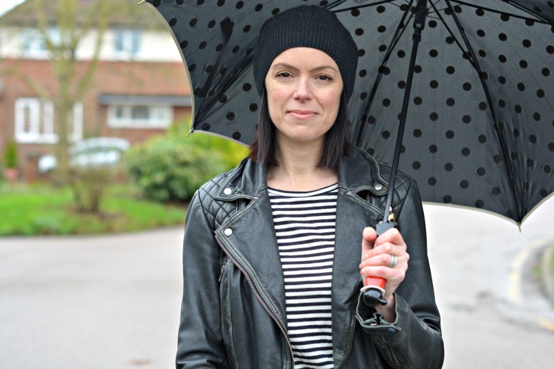 Moschino umbrella | AllSaints beanie | AllSaints Cargo leather biker jacket | Whistles breton striped top