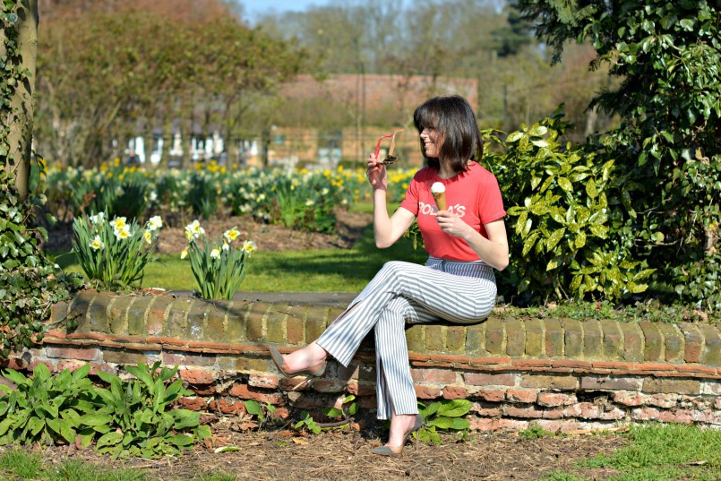 Rollas Red t-shirt | Acne Studios striped trousers | Gianvito Rossi Plexi pumps | Prada sunglasses