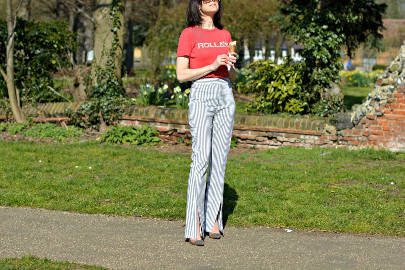 Rollas Red t-shirt | Acne Studios striped trousers | Gianvito Rossi Plexi pumps | Prada sunglasses