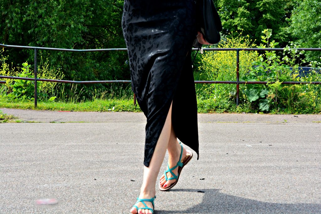 Flat sandals dressed up with LBD