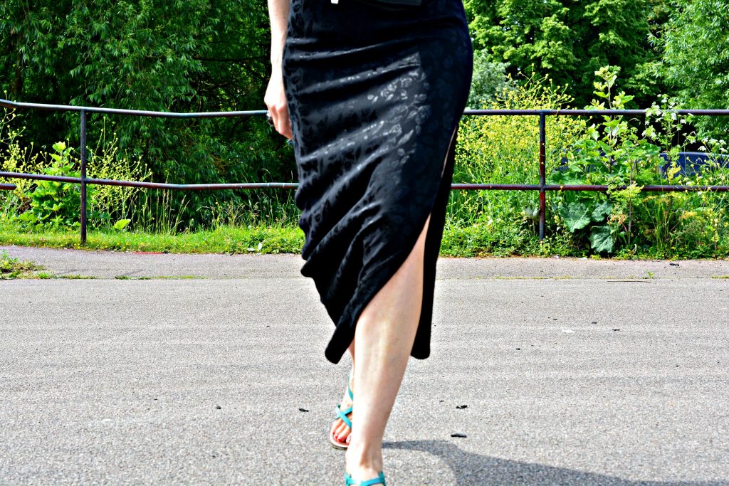 Flat sandals dressed up with LBD