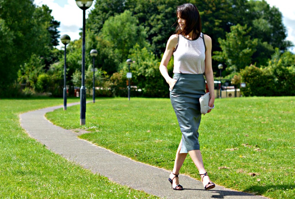 How to wear a grey leather midi pencil skirt over 40 | Urbancode skirt | Maje vest | Prada sandals | Alexander Wang clutch