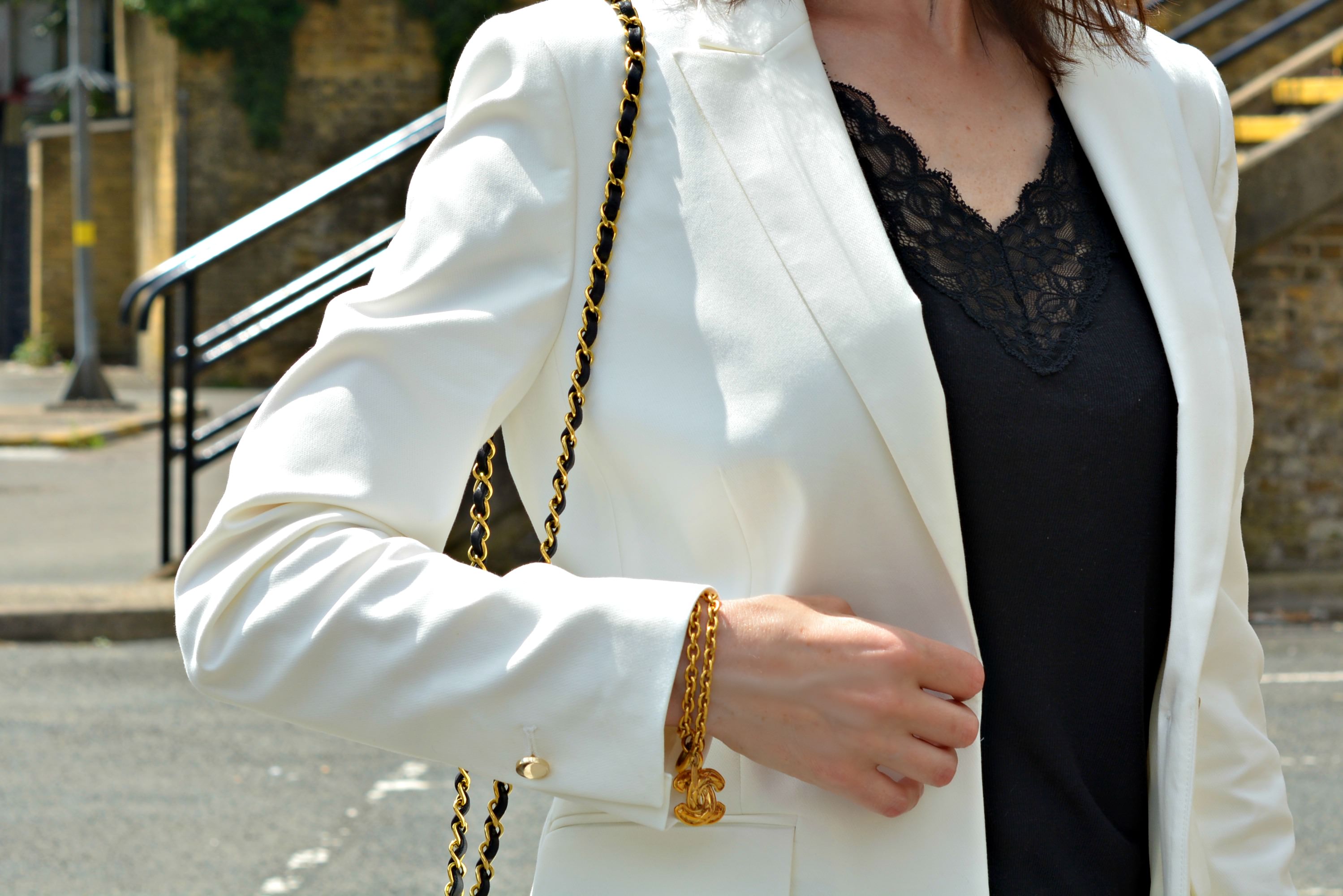 Marks and Spencer White top Style Challenge Fashion over 40 - white blazer with denim shorts and vintage chanel accessories