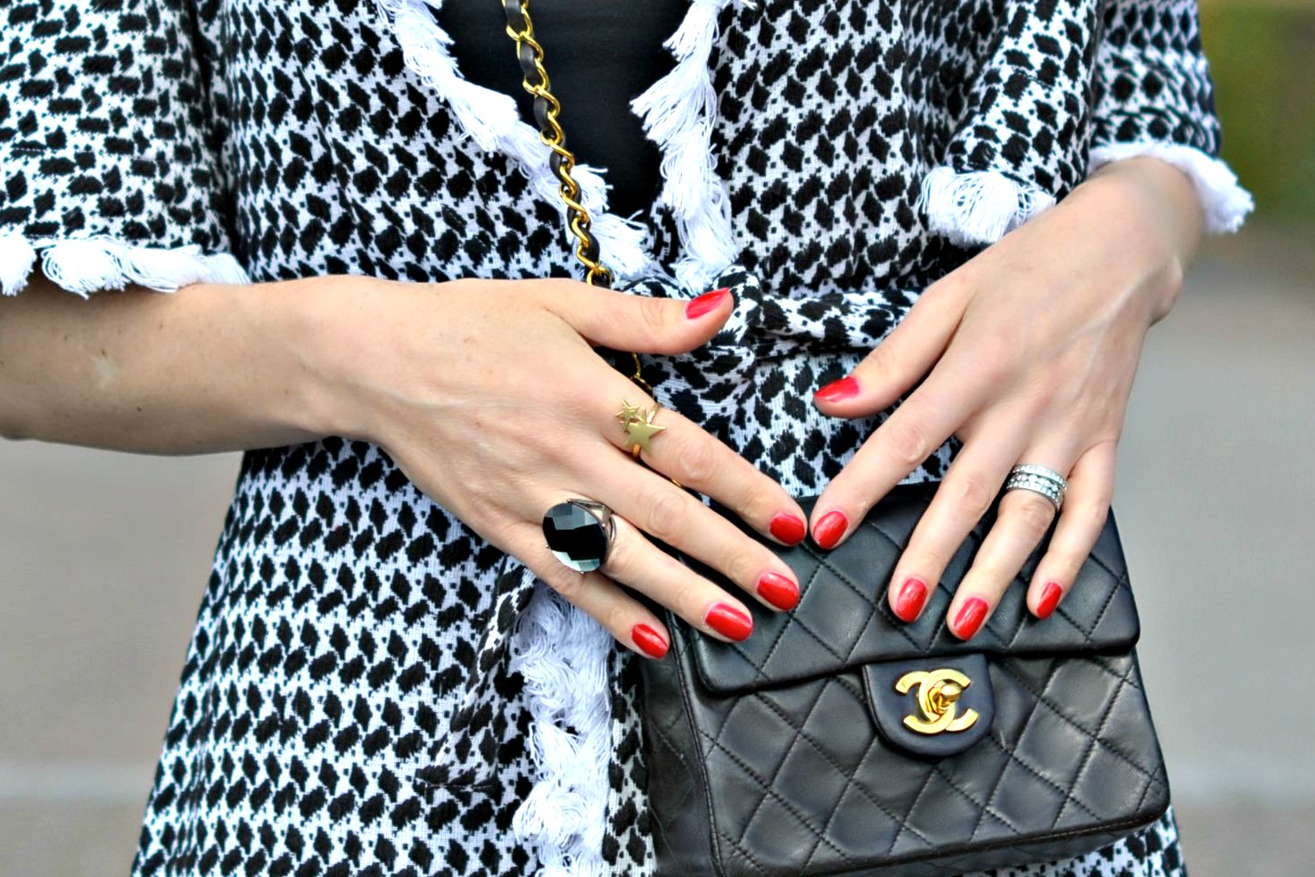 Mixing metals wearing silver,gold & platinum rings together with Chanel mini 2.55 bag