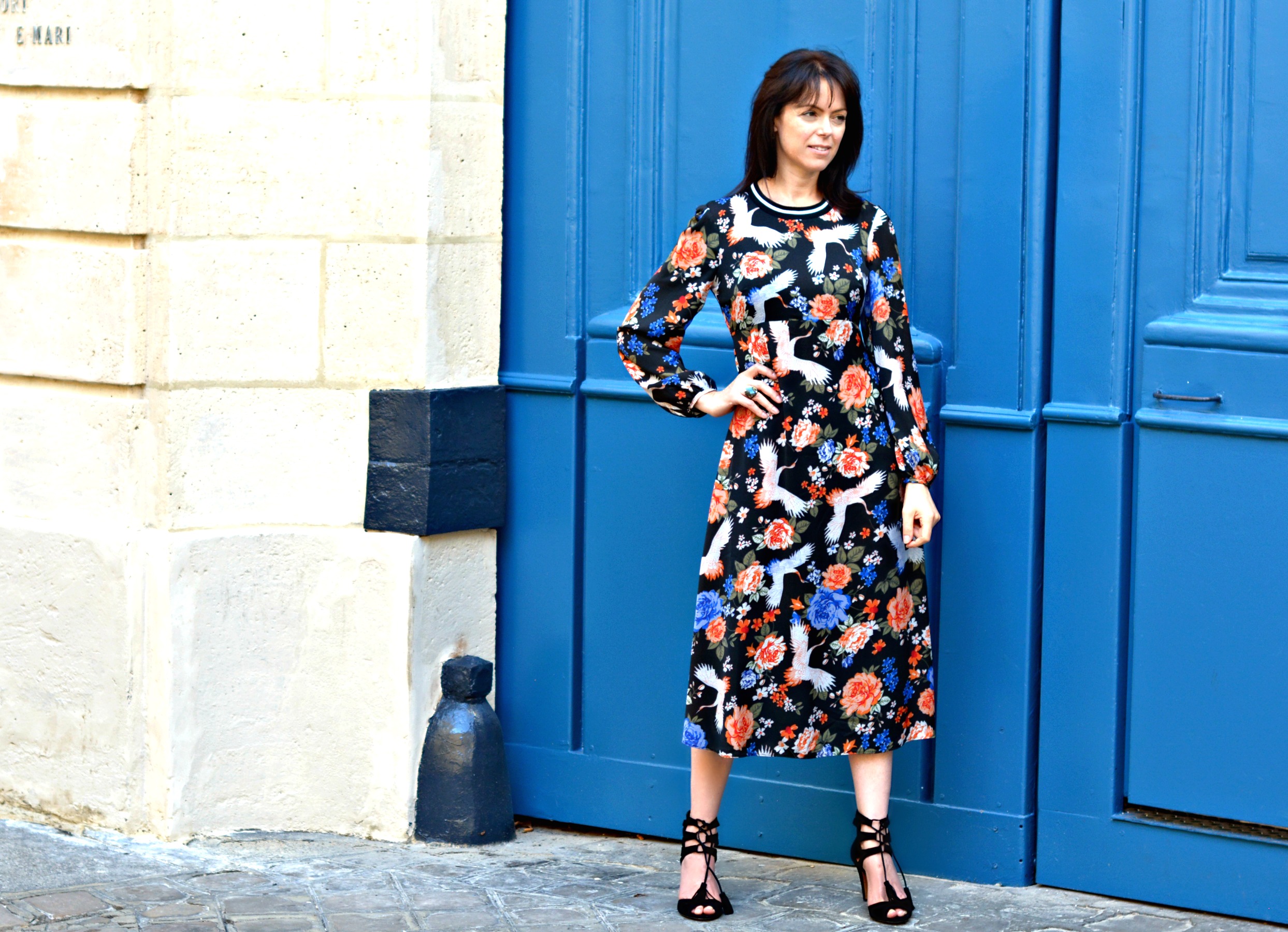 A long sleeved floral midi dress is perfect for going from day to night
