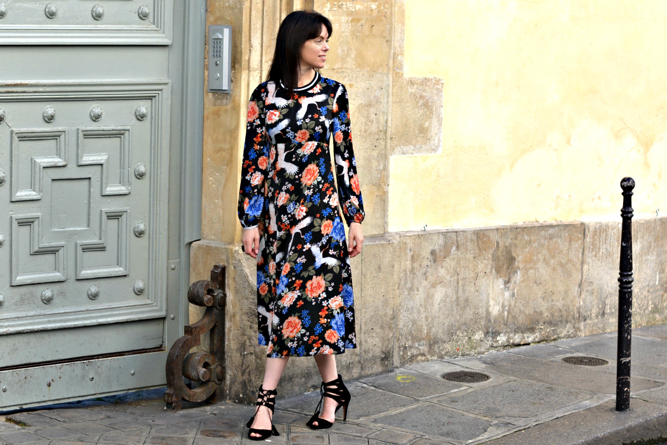 A long sleeved floral midi dress is perfect for going from day to night in Paris