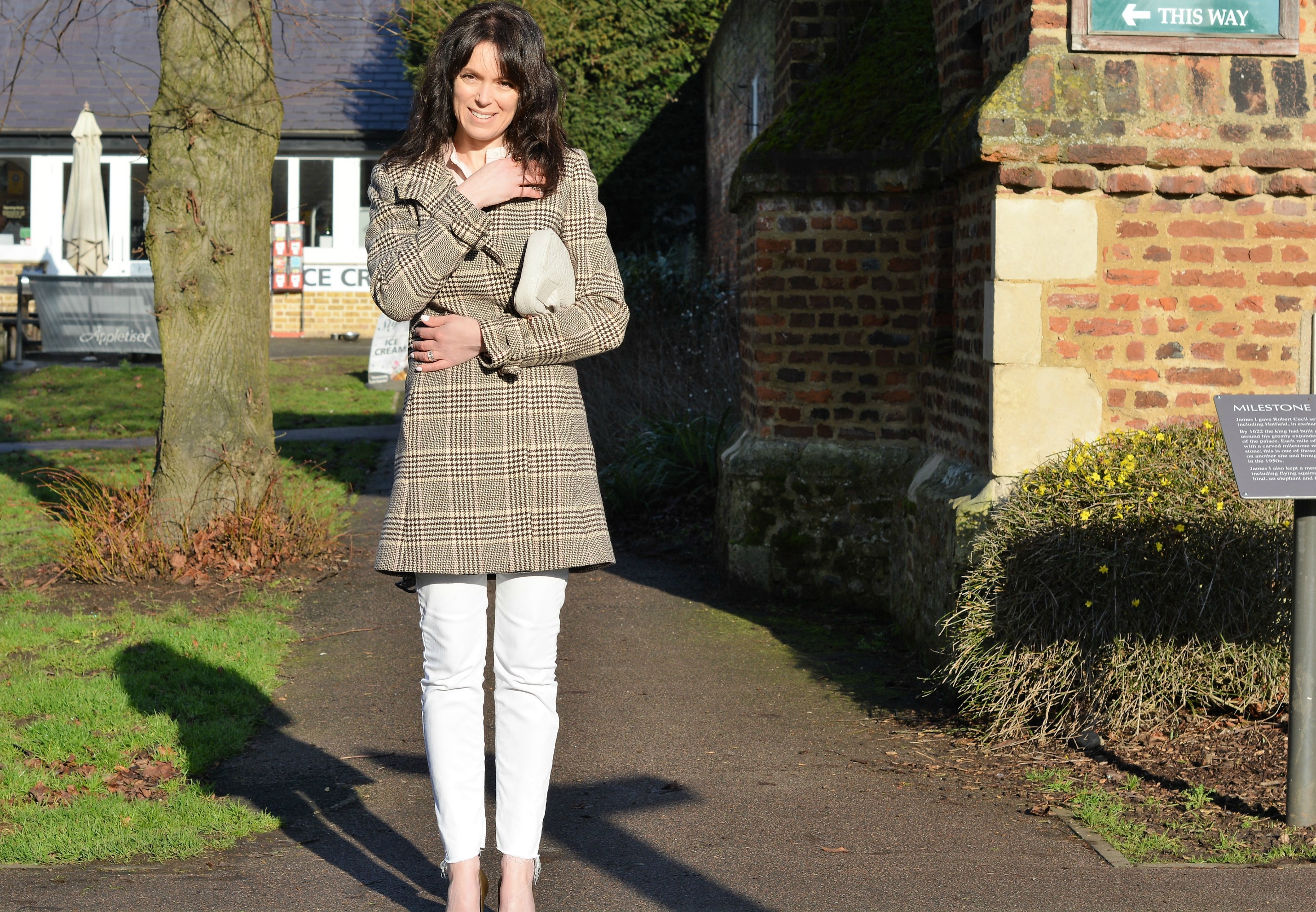 Chocolate brown plaid wool coat with white skinny jeans - Fashion over 40