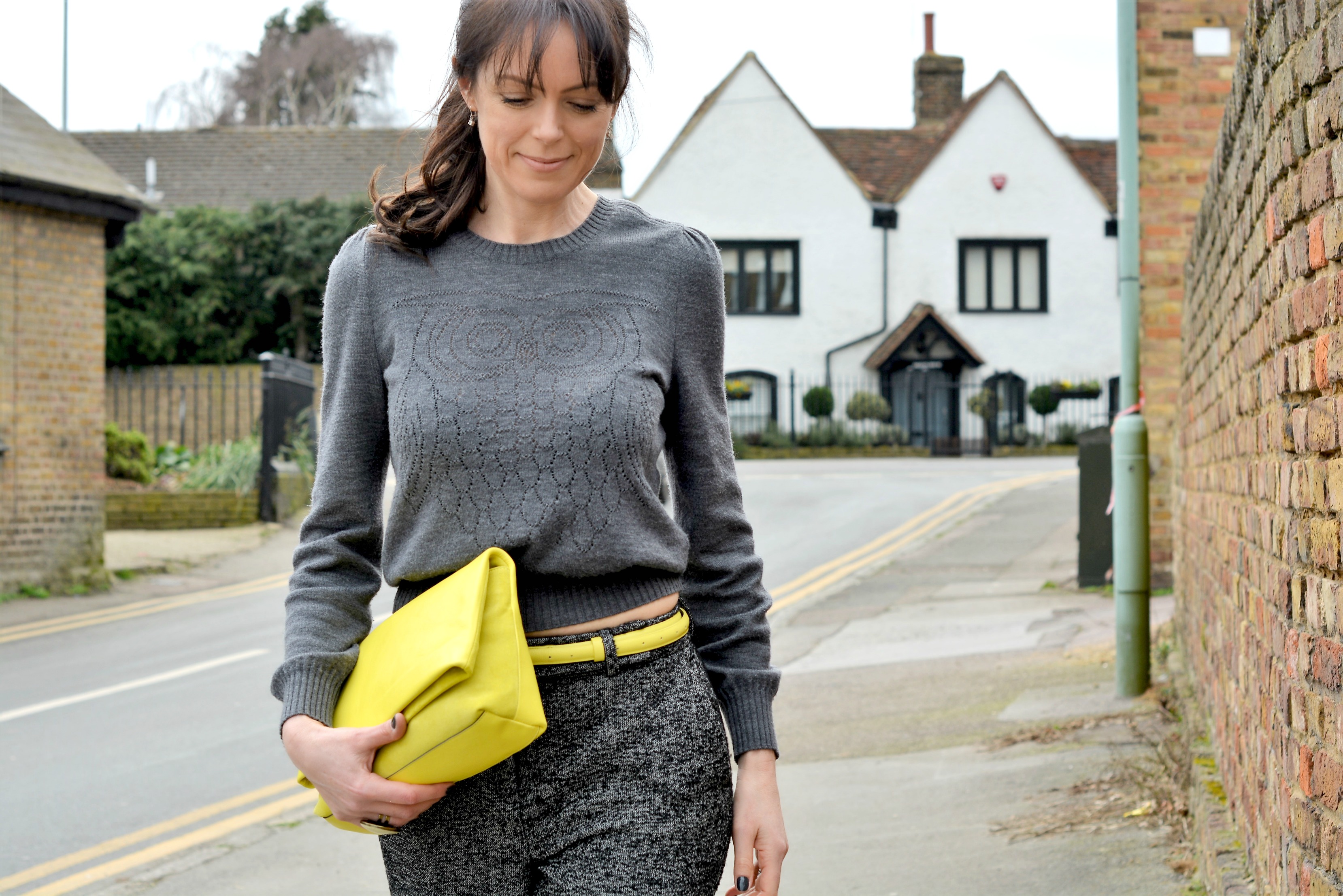 yellow pop of colour with grey outfit