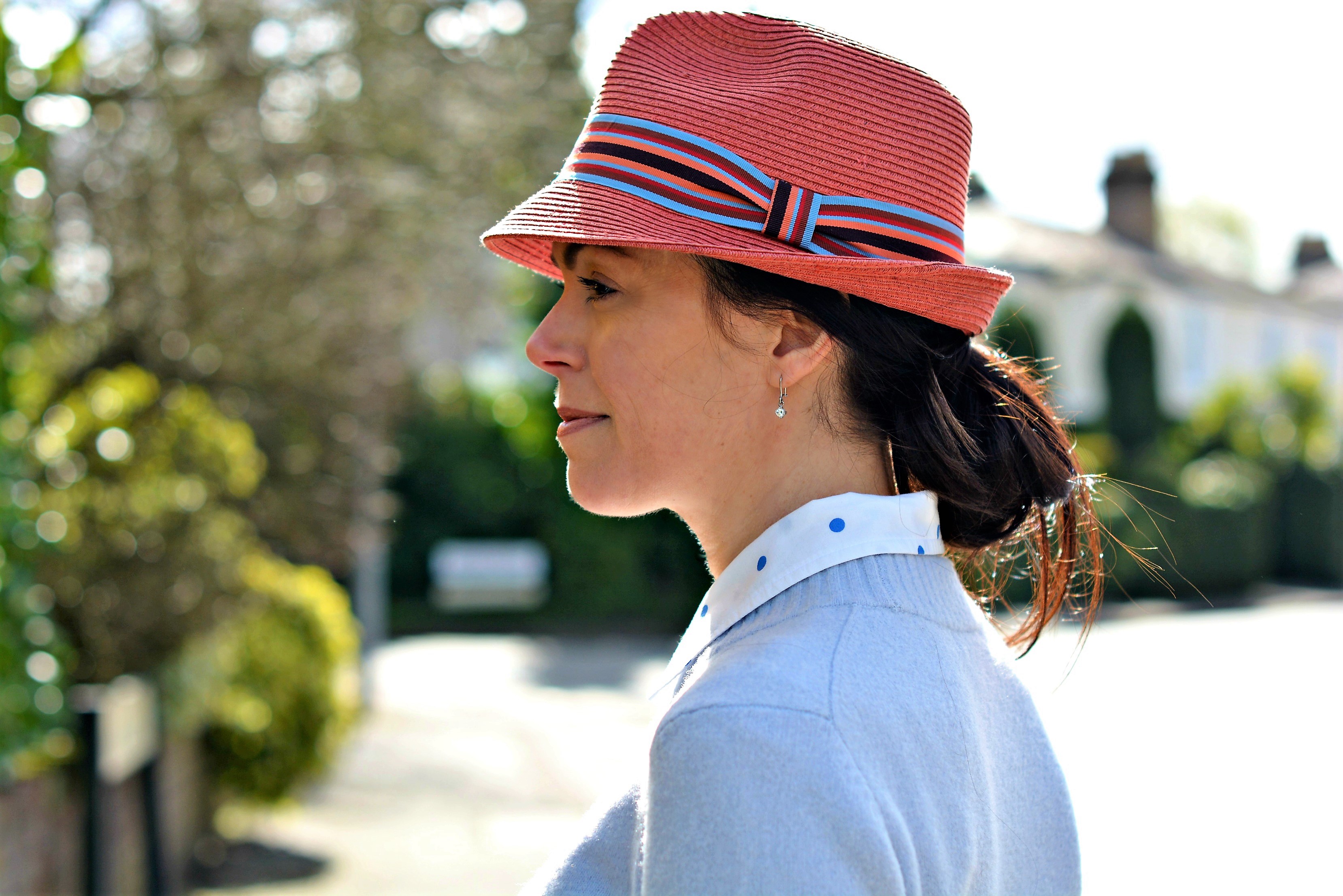 coral trilby hat with stripe ribbon