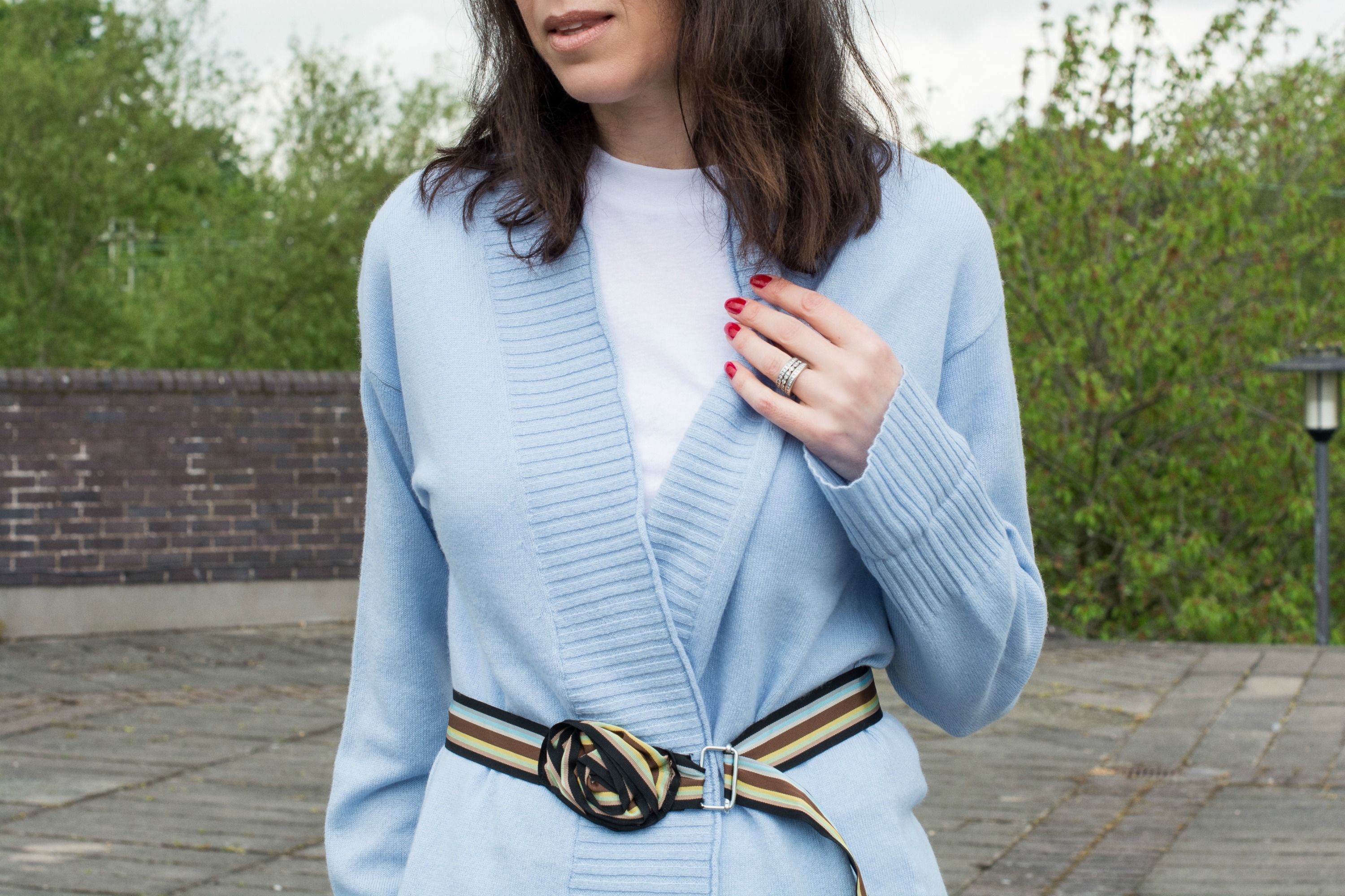 blue cashmere cardigan with white jeans and white t shirt