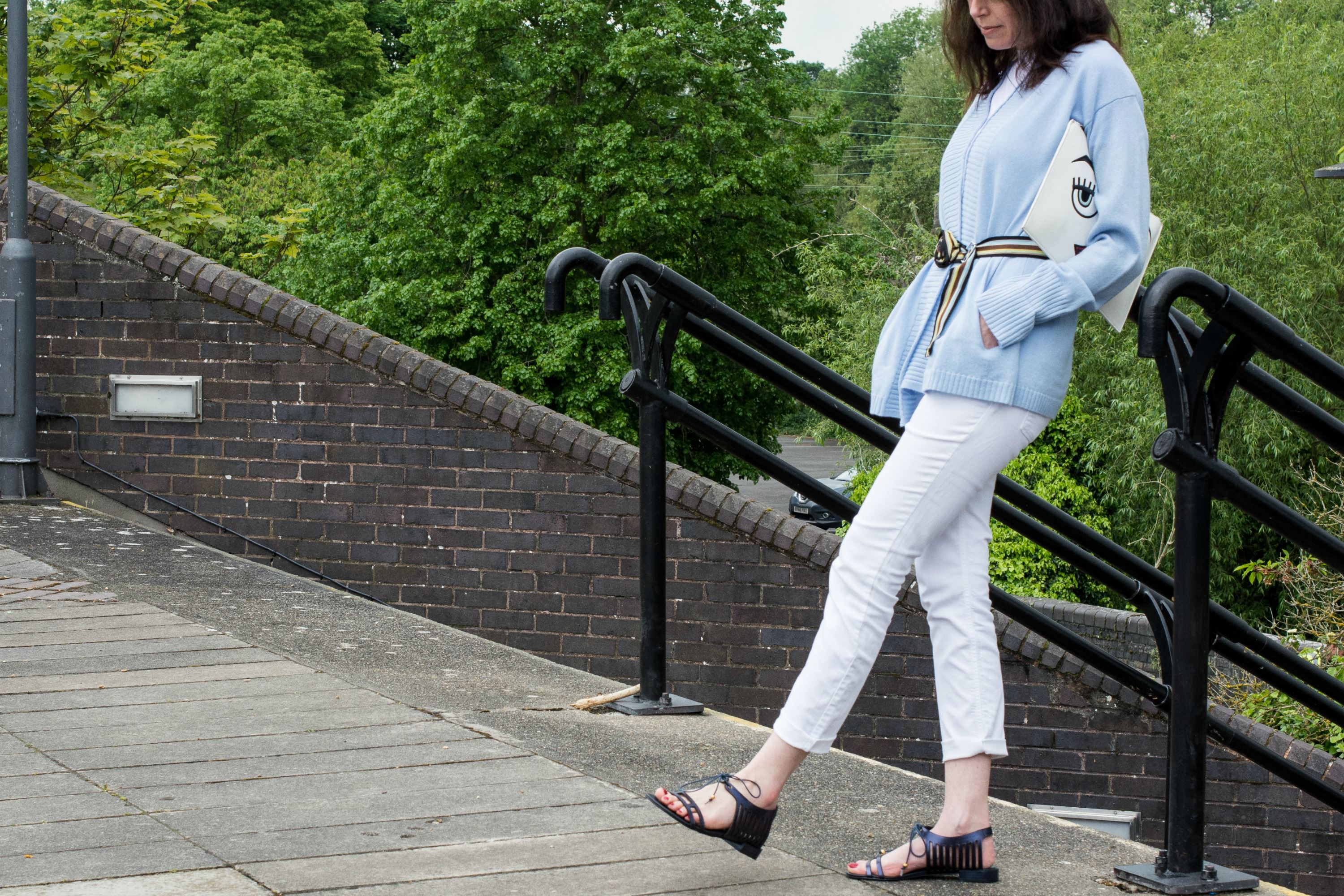 blue cashmere cardigan with white jeans and white t shirt