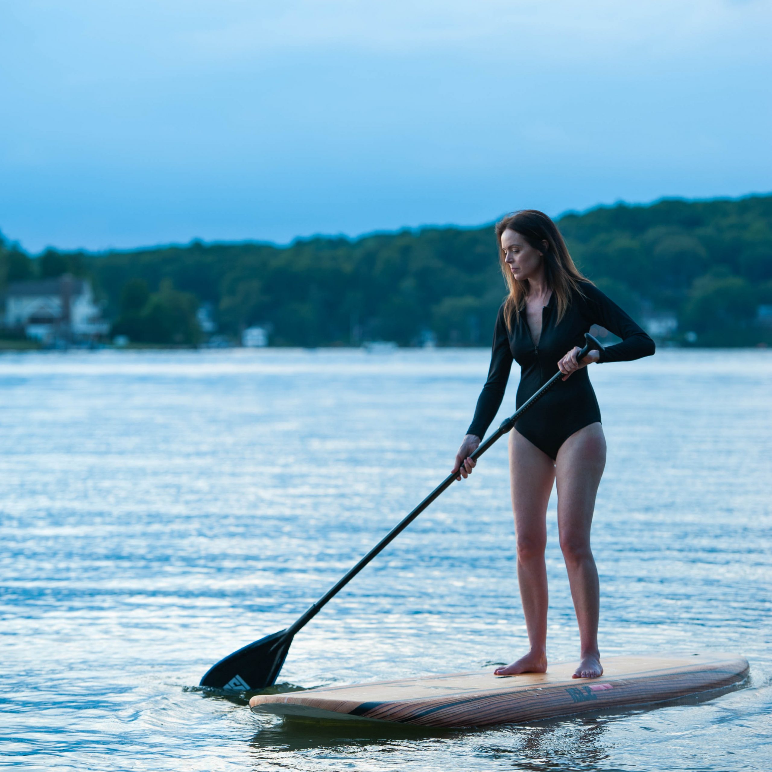 zip-front-long-sleeved-black-swimsuit-made-from-recycled-plastic-bottles-by-sustainable-brand-indigoluna