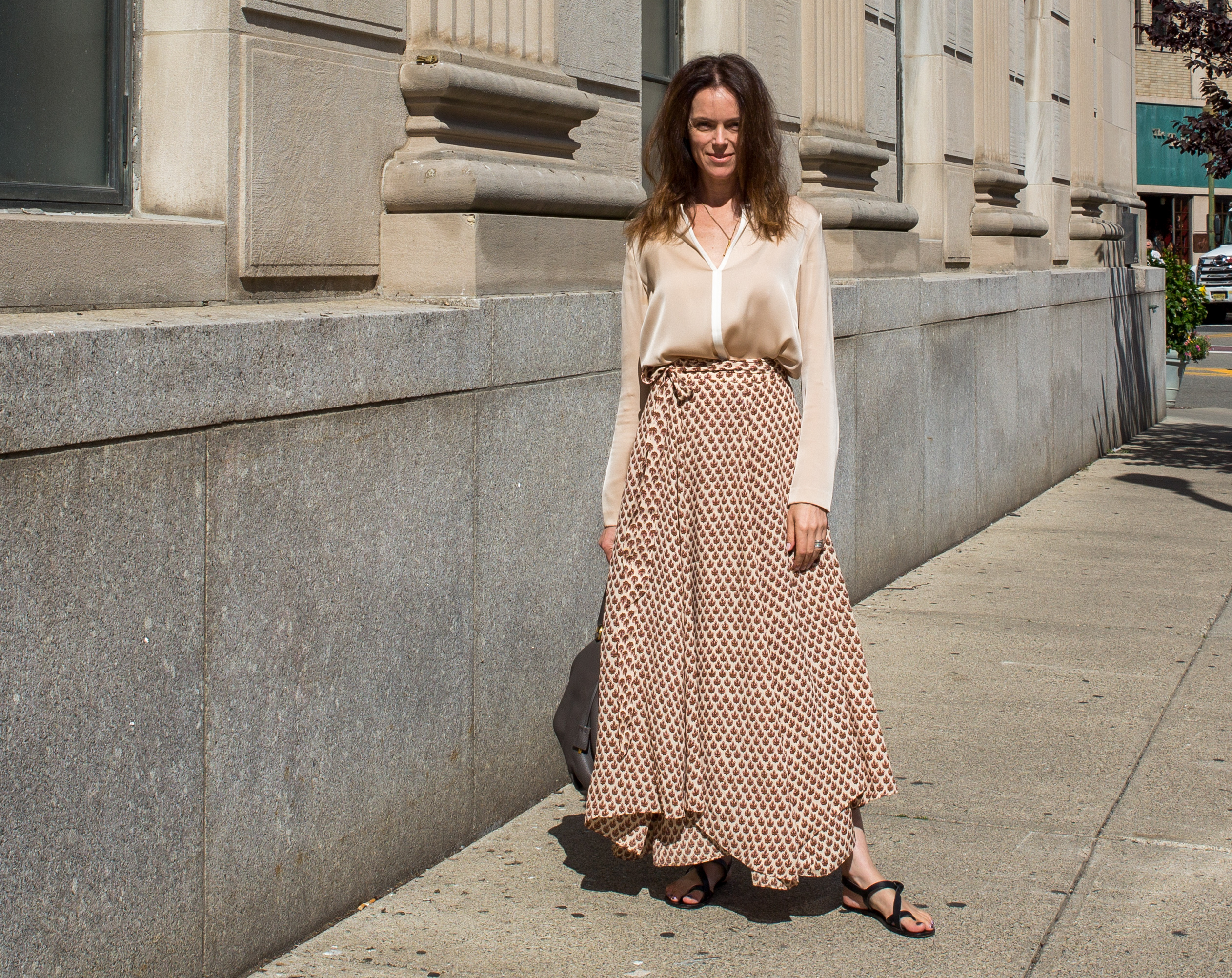 gold-silk-blouse-from-winserlondon-paired-with-full-circle-wrap-skirt-from-doen-both-sustainable-brands