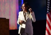 photographer credit angela weiss-getty-kamala harris white suit white pussy bow blouse speech